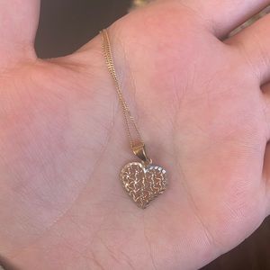 People’s woven heart pendent necklace